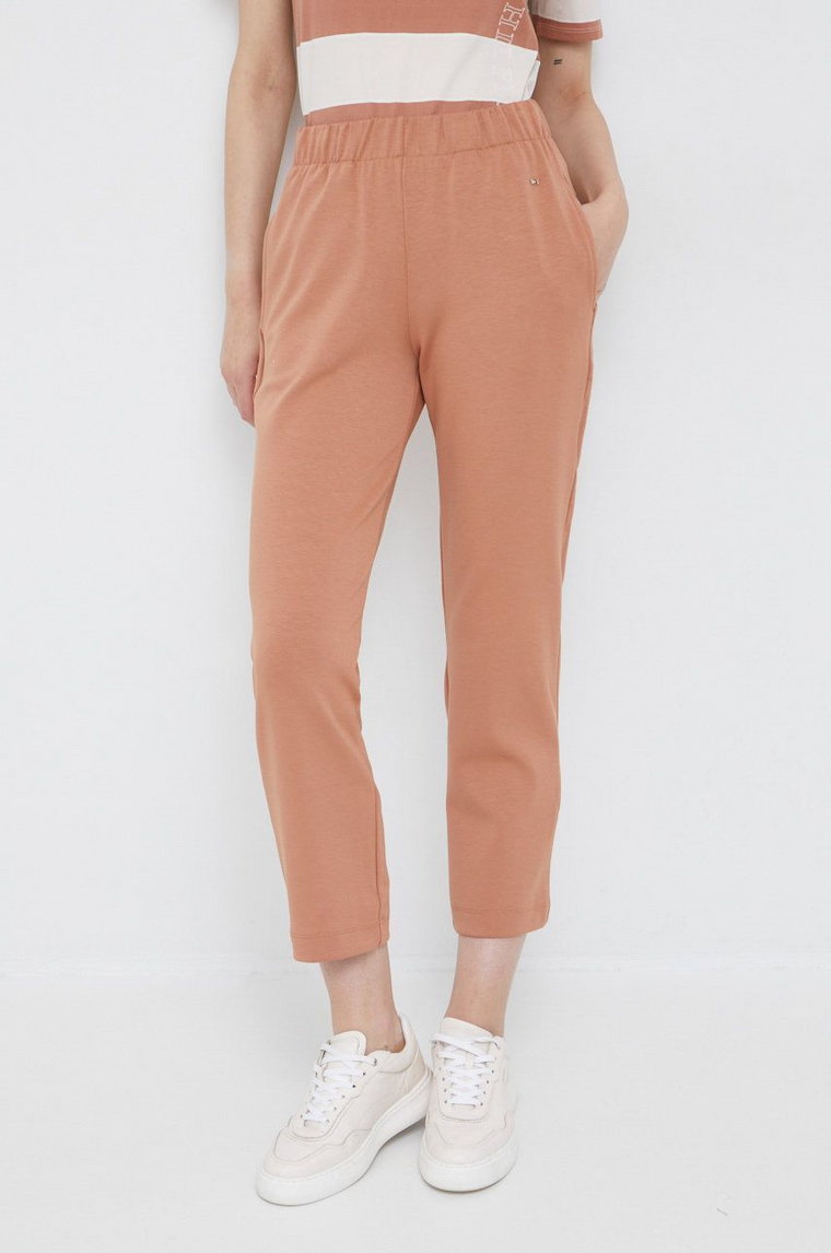 Tommy Hilfiger spodnie dresowe damskie kolor pomarańczowy gładkie