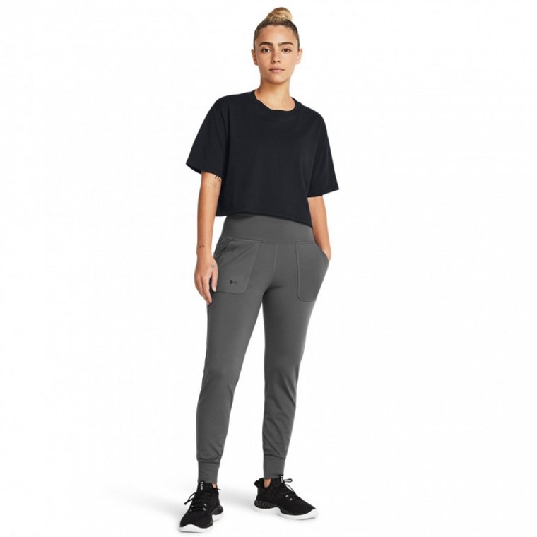 Damskie spodnie treningowe Under Armour Motion Jogger - szare