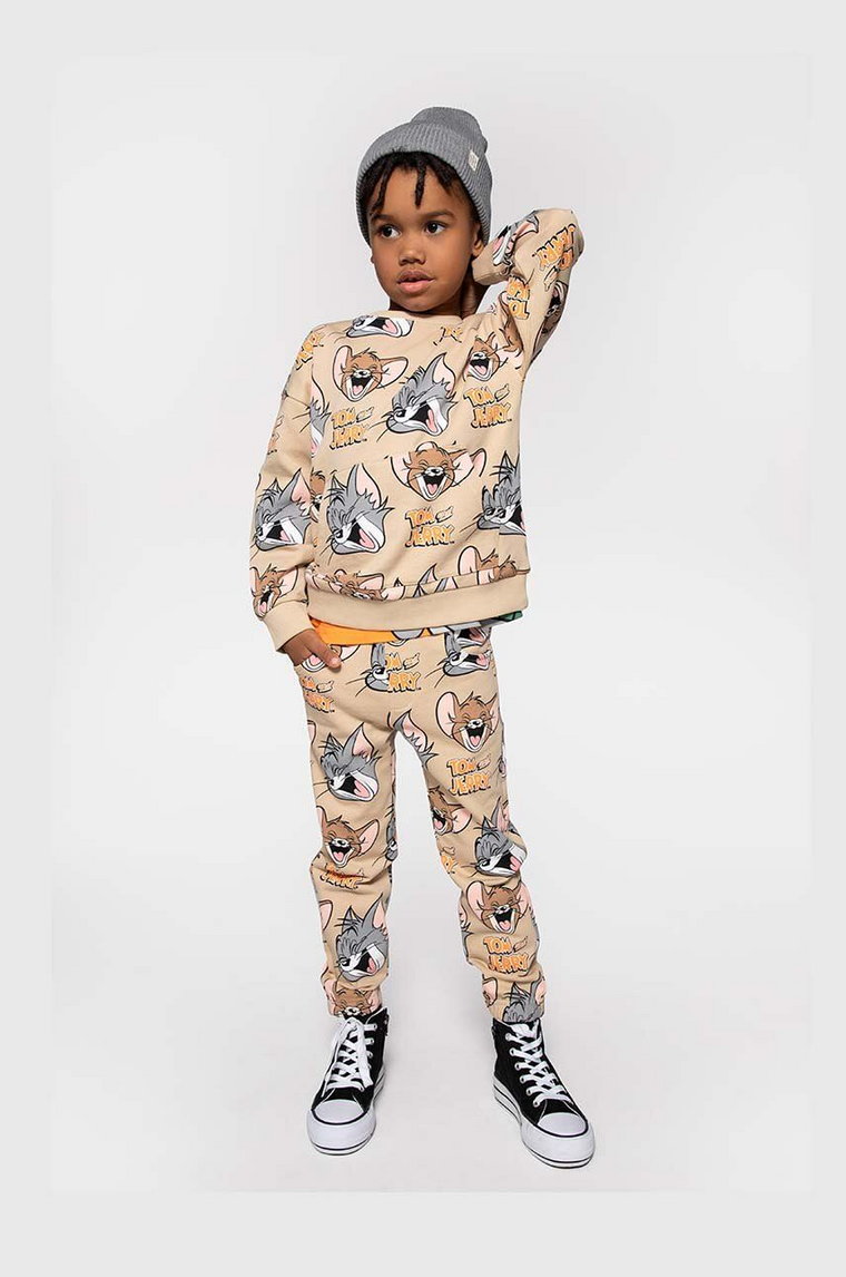 Coccodrillo spodnie dresowe bawełniane dziecięce kolor beżowy wzorzyste