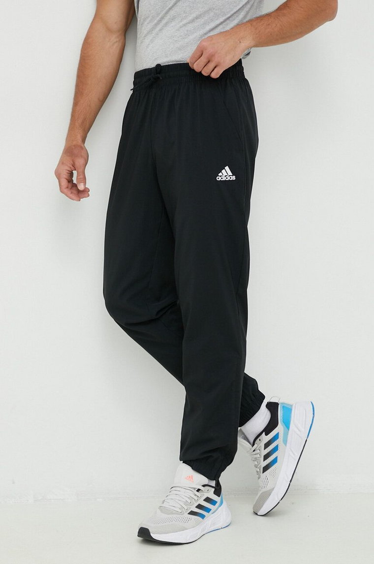 adidas spodnie treningowe Essentials kolor czarny gładkie IC9424