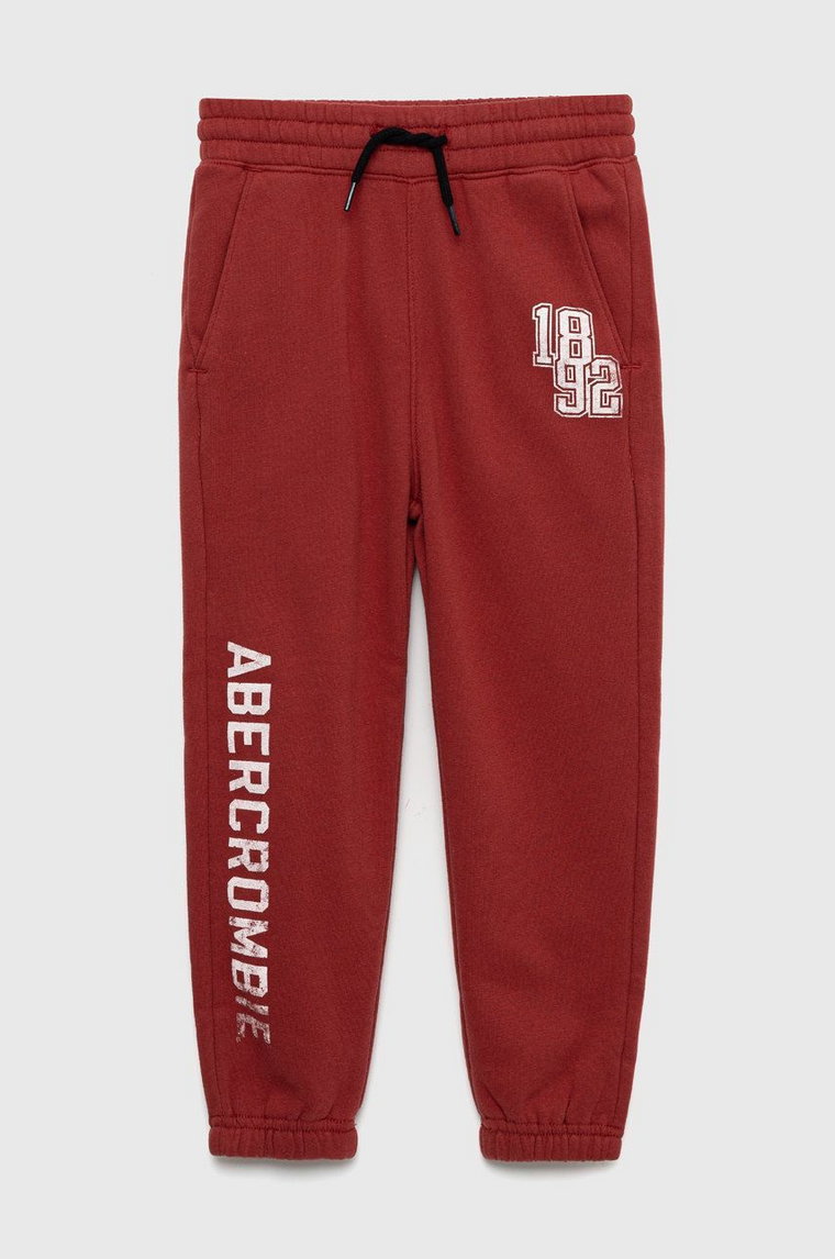 Abercrombie & Fitch spodnie dresowe dziecięce kolor czerwony gładkie
