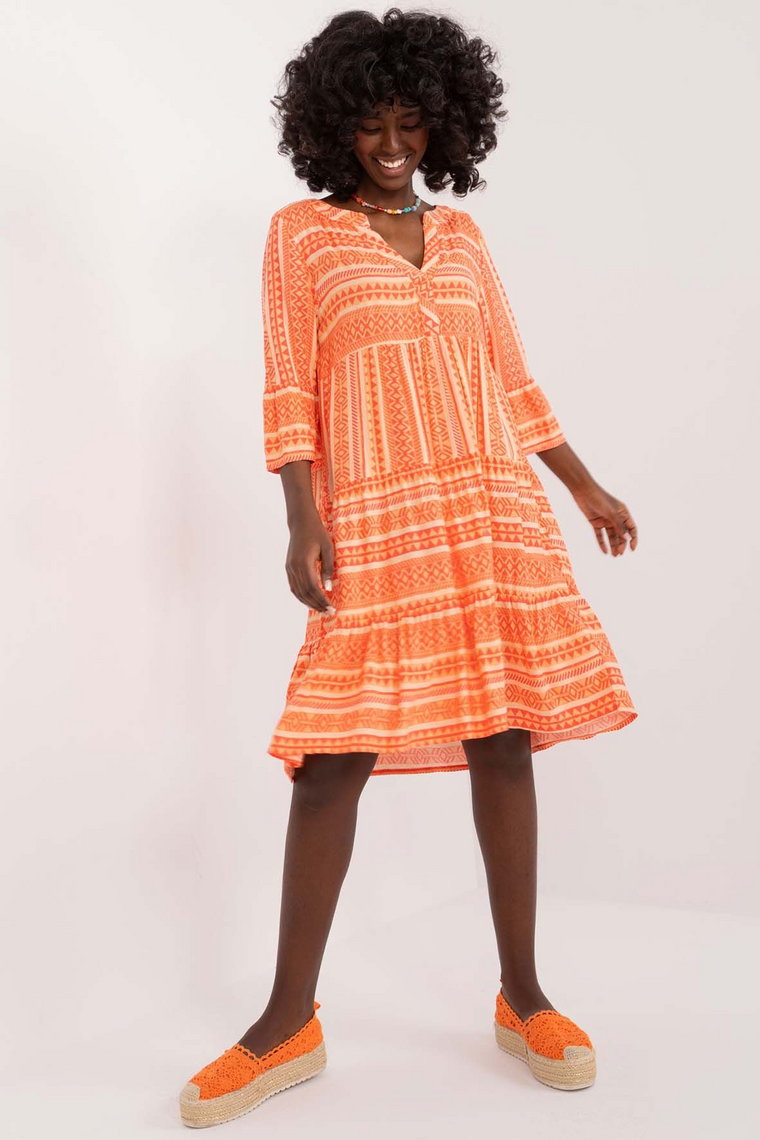 Damska sukienka pomarańczowa z falbaną i printem Sublevel