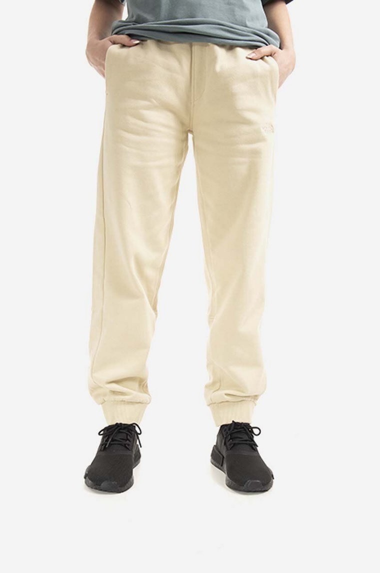 The North Face spodnie dresowe bawełniane Oversized Jogger kolor beżowy gładkie NF0A5IGE-3X4