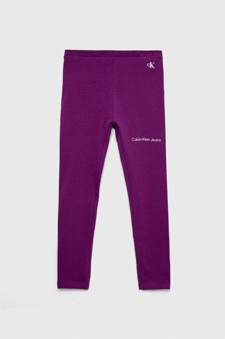 Calvin Klein Jeans legginsy dziecięce kolor fioletowy z nadrukiem