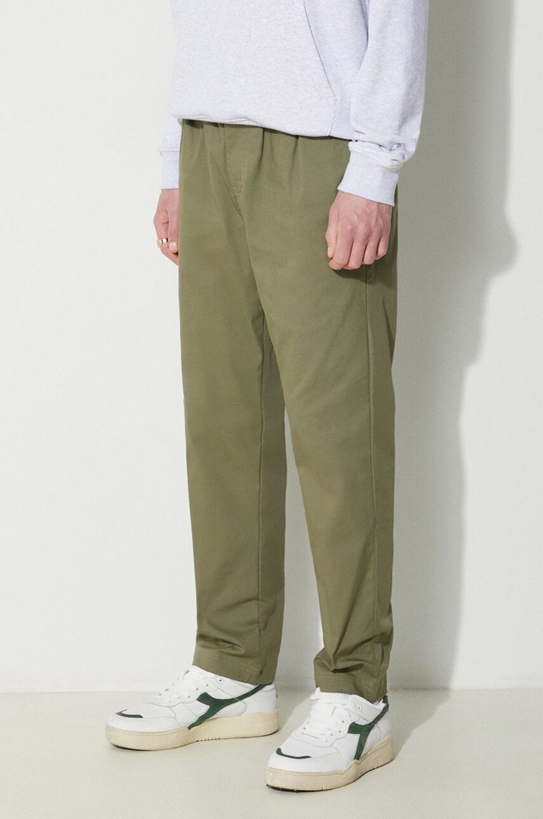 New Balance spodnie MP41575DEK męskie kolor zielony proste