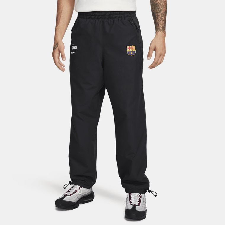 Męskie dresowe spodnie piłkarskie Nike FC Barcelona x Patta - Czerń