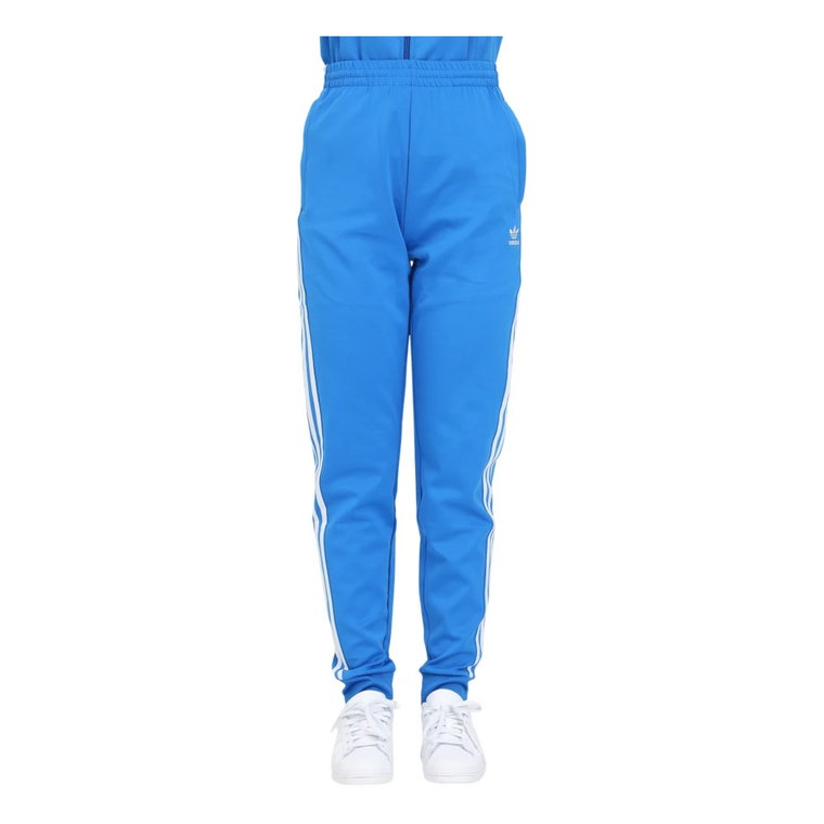 Sportowe spodnie damskie w kolorze Celeste z 3 paskami Adidas Originals