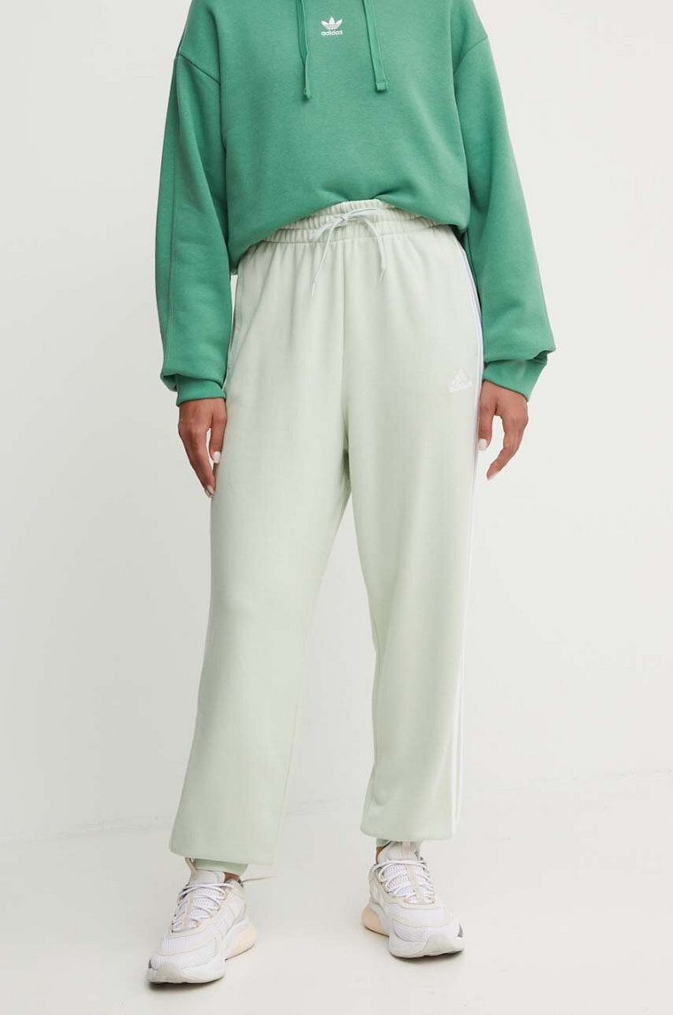 adidas spodnie dresowe bawełniane Essentials kolor zielony wzorzyste IY4236