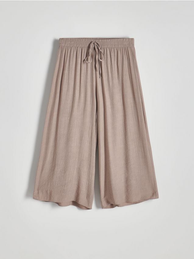 Reserved - Spodnie culotte z wiskozą - beżowy