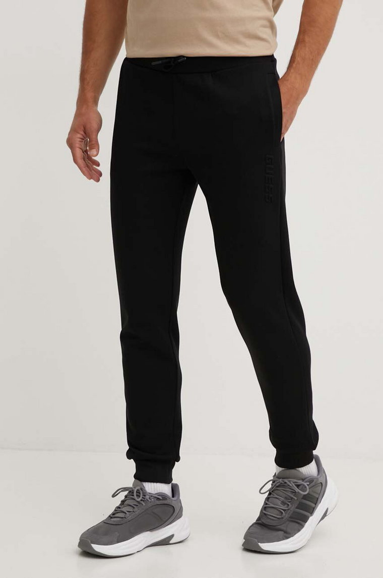 Guess spodnie dresowe SHEEN kolor czarny gładkie Z4YB03 KC3D2