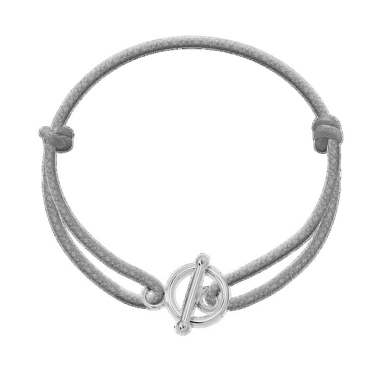 Bransoletka ze srebrnym okrągłym zapięciem na grubym jasnoszarym sznurku