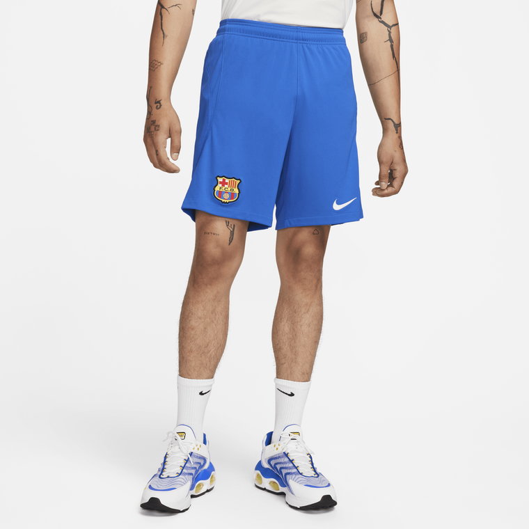 Męskie spodenki piłkarskie Nike Dri-FIT FC Barcelona Stadium 2023/24 (wersja wyjazdowa) - Niebieski