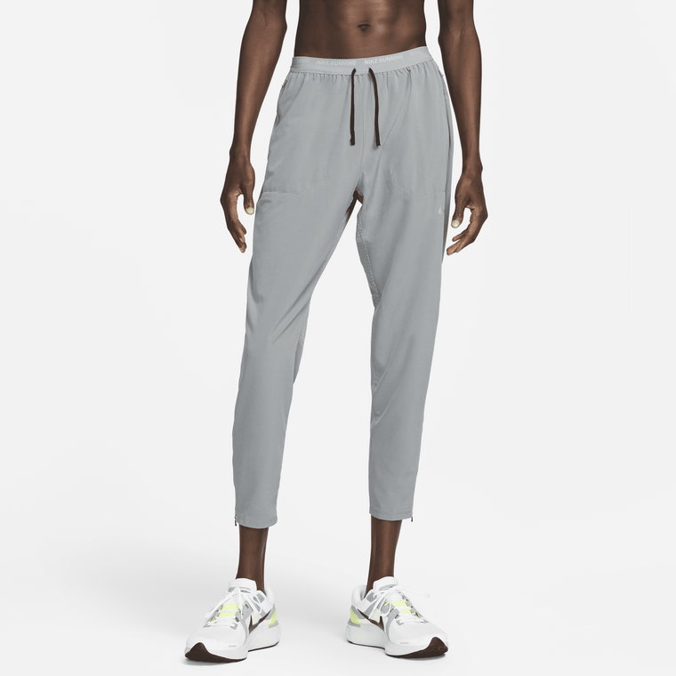 Męskie spodnie do biegania z tkaniny Nike Dri-FIT Phenom - Zieleń