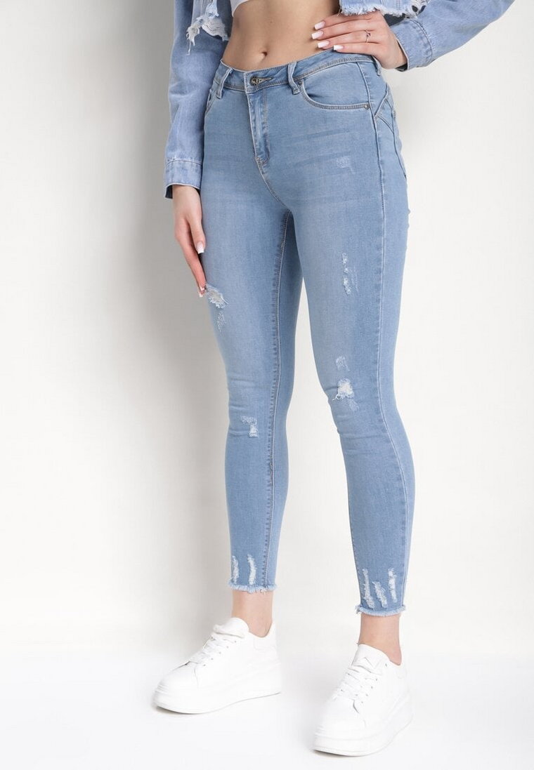 Jasnoniebieskie Jeansy Skinny z Efektem Push Up i Przetarciami Pyrallis