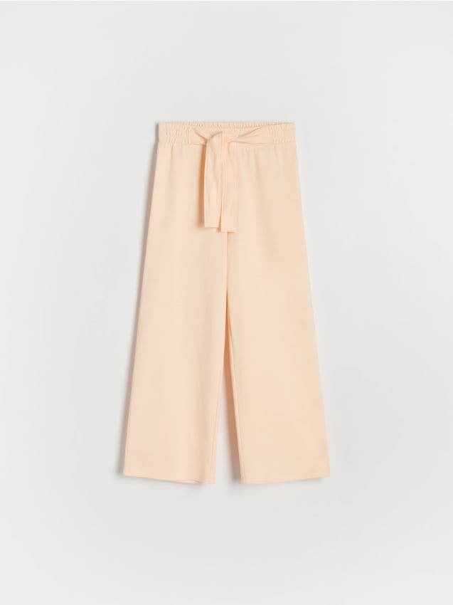 Reserved - Bawełniane spodnie - jasnopomarańczowy