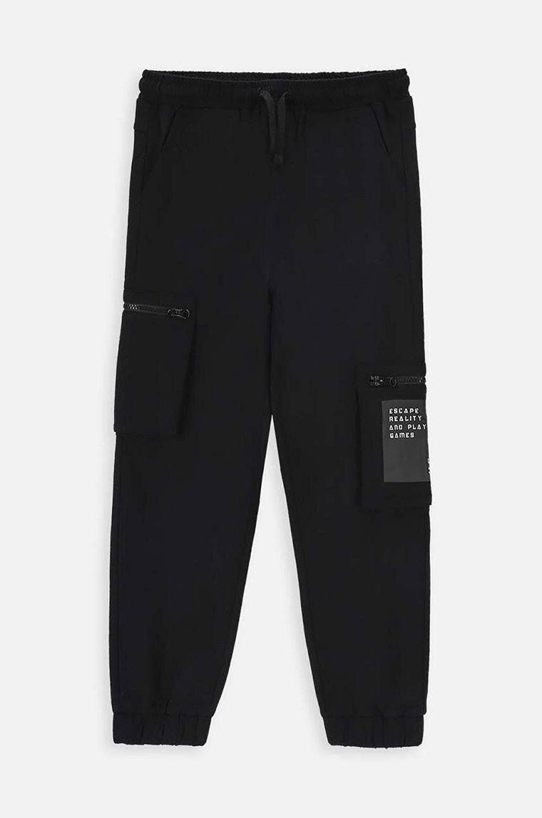 Coccodrillo spodnie dresowe dziecięce kolor czarny z nadrukiem