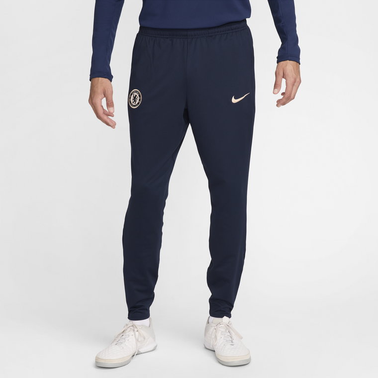 Męskie spodnie piłkarskie z dzianiny Nike Dri-FIT Chelsea F.C. Strike - Niebieski