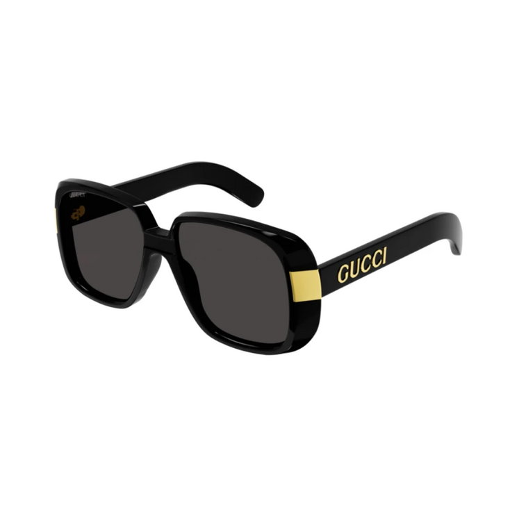Stylowe okulary przeciwsłoneczne w czarnym i złotym kolorze Gucci