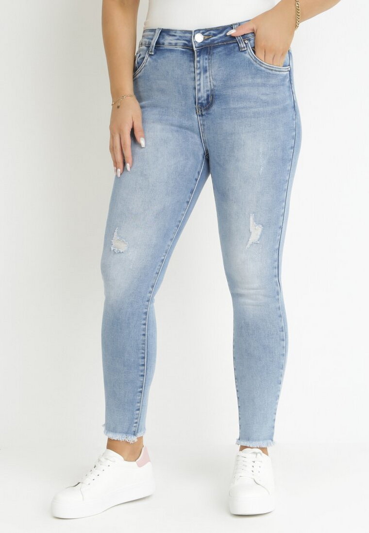 Jasnoniebieskie Jeansy Skinny z Przetarciami Leovena