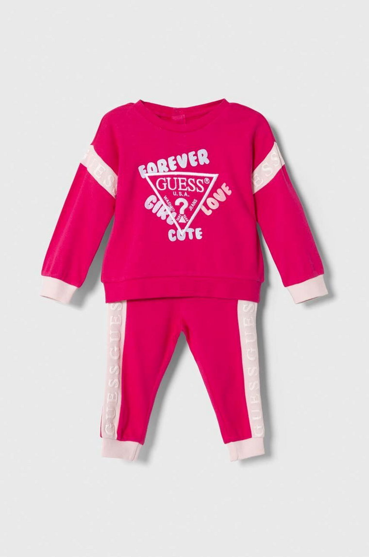 Guess dres bawełniany niemowlęcy kolor różowy