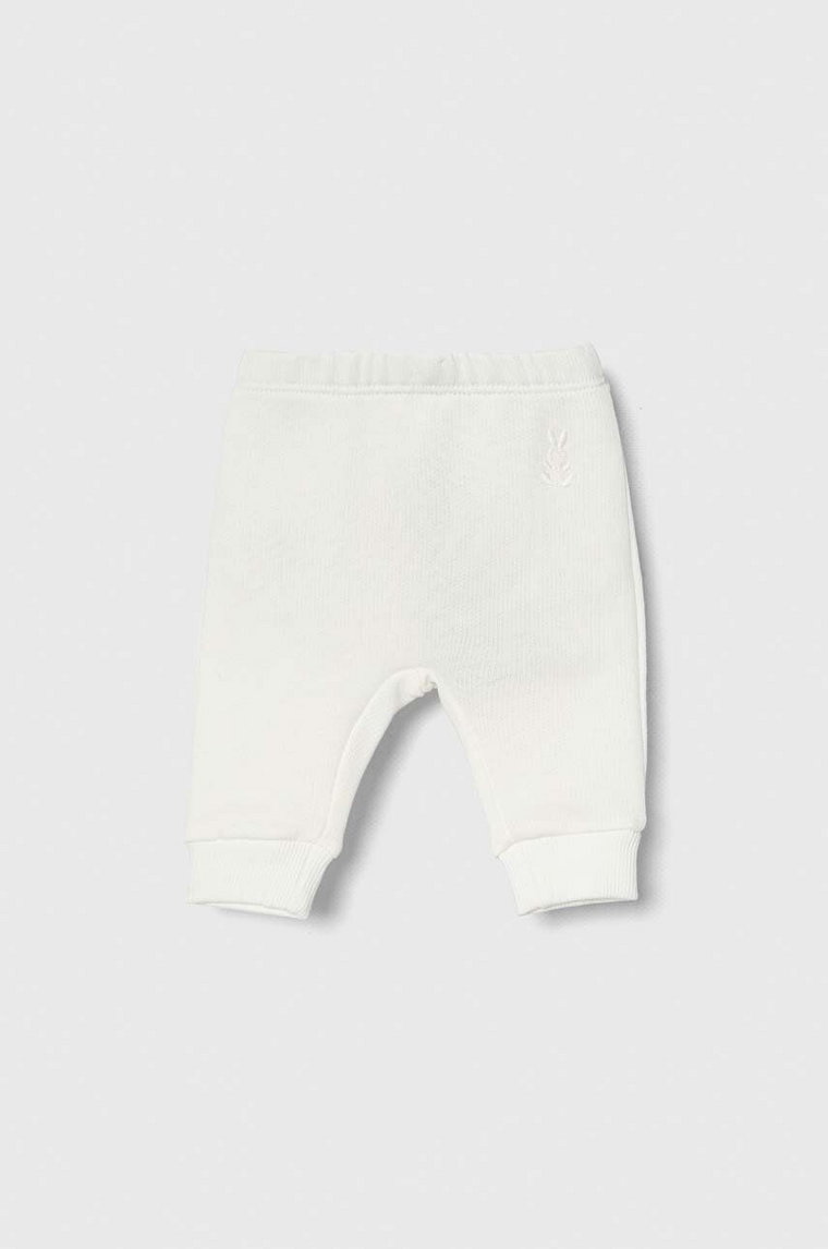 United Colors of Benetton spodnie dresowe bawełniane niemowlęce kolor biały melanżowe
