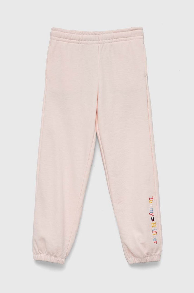 Tommy Hilfiger spodnie dresowe dziecięce kolor różowy z aplikacją