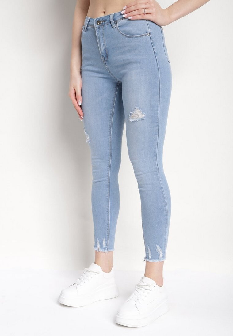 Jasnoniebieskie Jeansy Skinny z Przetarciami i Dziurami Honnaira