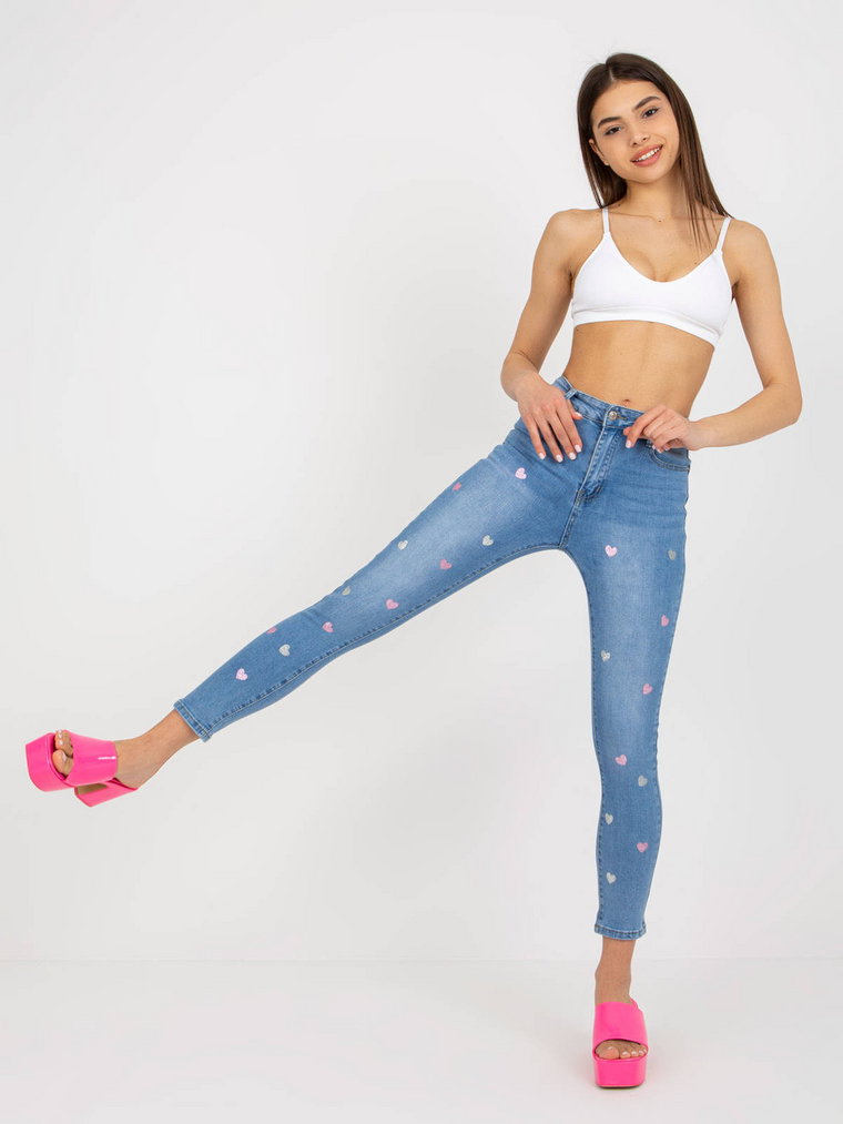 Spodnie jeans jeansowe niebieski casual rurki nogawka zwężana suwak guziki