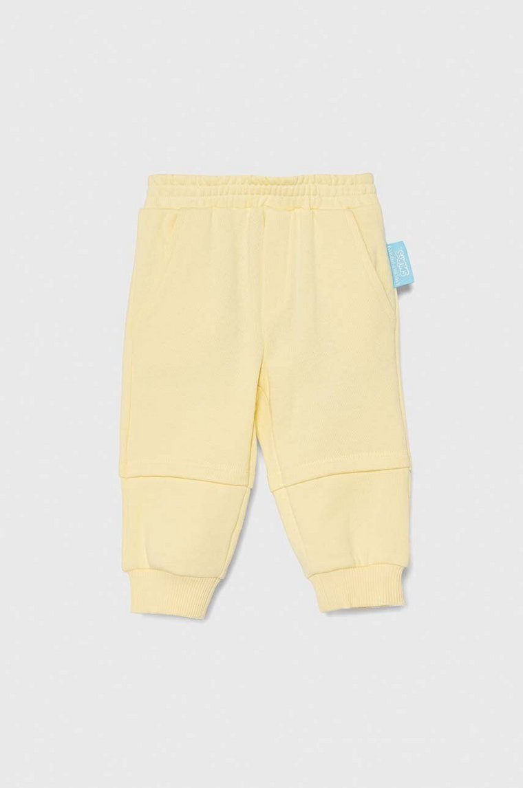 Emporio Armani spodnie dresowe bawełniane niemowlęce x The Smurfs kolor żółty gładkie