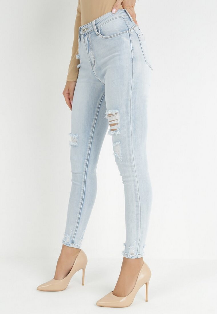 Jasnoniebieskie Jeansy Skinny z Przetarciami Push Up Firno