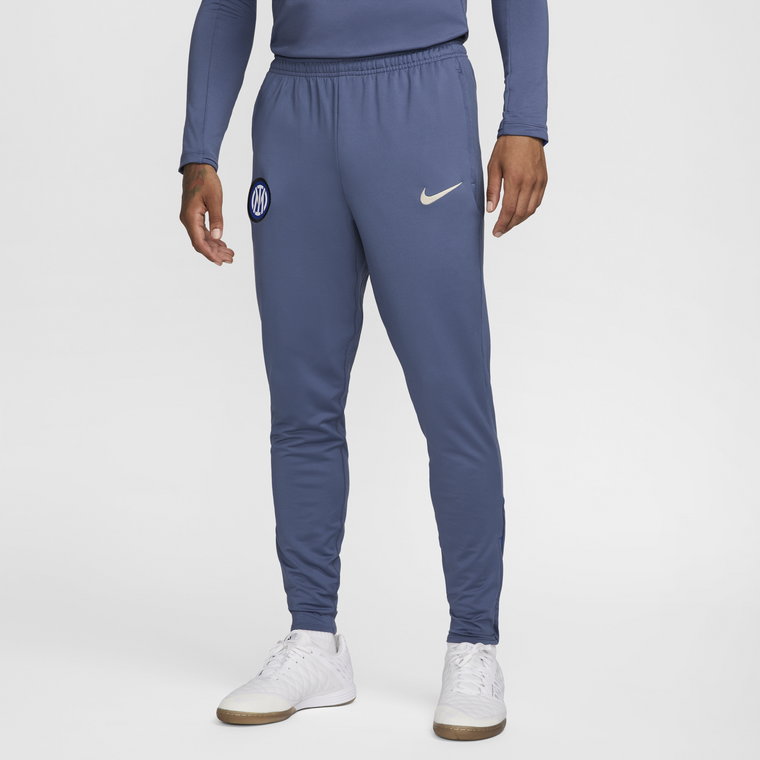 Męskie spodnie piłkarskie Nike Dri-FIT Inter Mediolan Strike - Niebieski