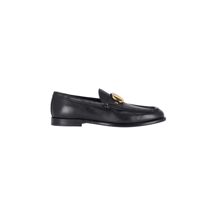 Czarne płaskie buty z ikonicznym logo i złotą klamrą Valentino Garavani