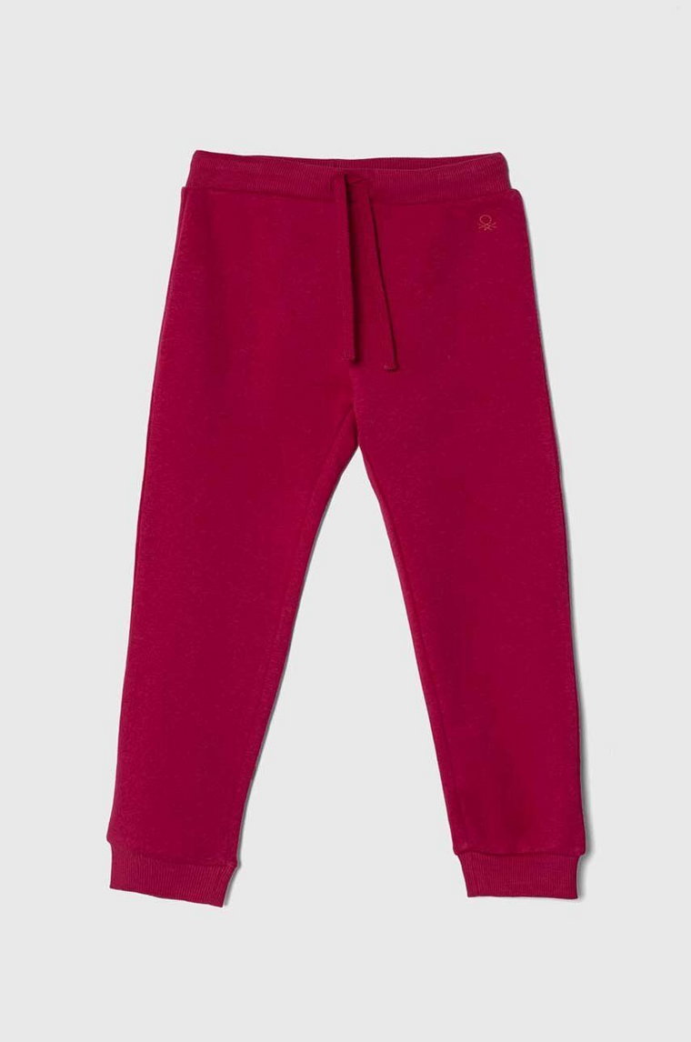 United Colors of Benetton spodnie dresowe dziecięce kolor różowy gładkie