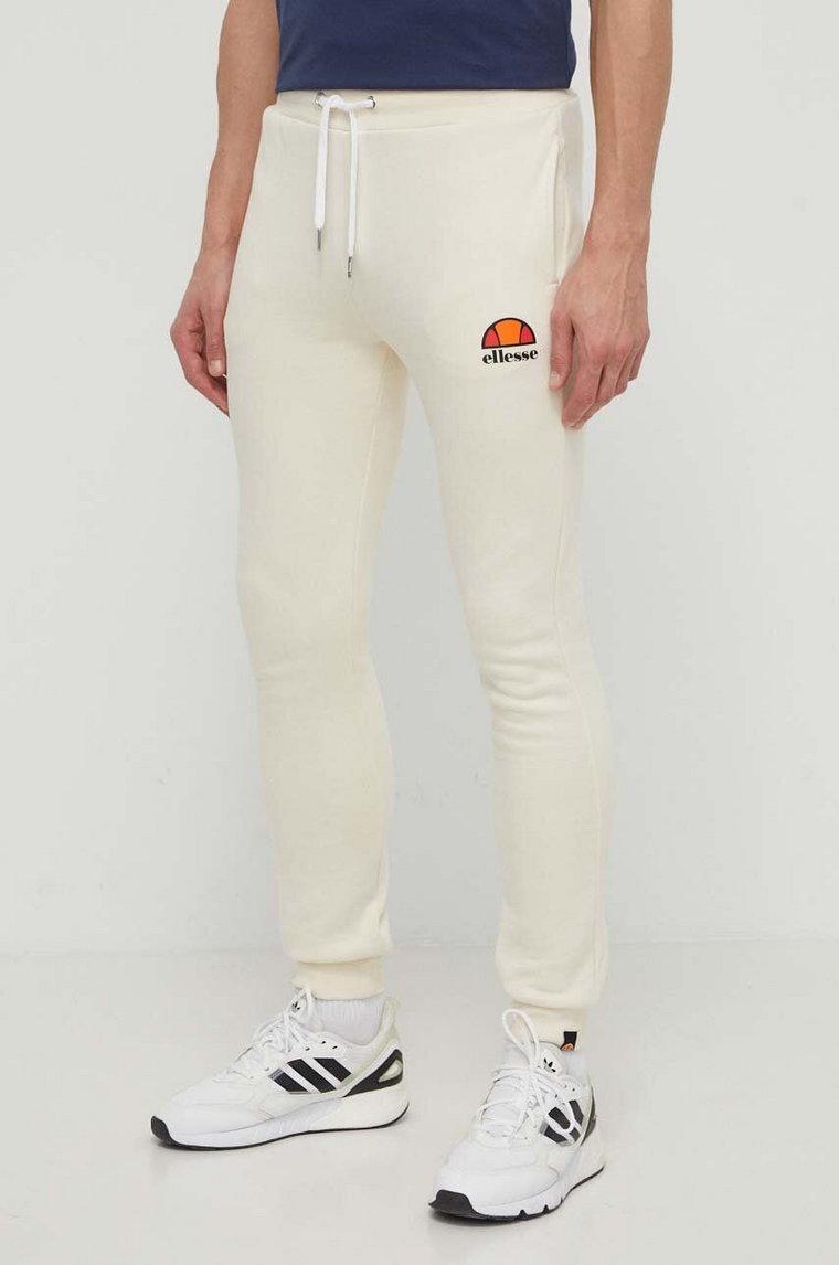 Ellesse spodnie dresowe Ovest Jog Pant kolor beżowy z nadrukiem SHV01763