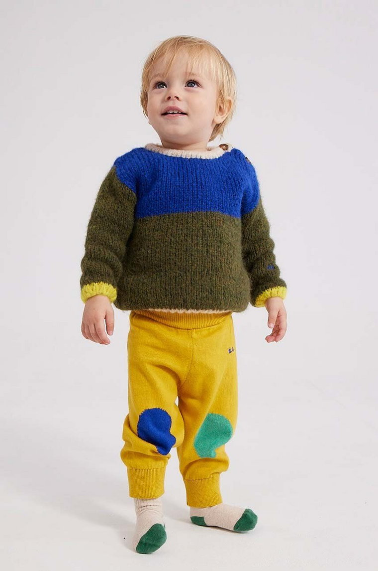 Bobo Choses spodnie dresowe bawełniane niemowlęce kolor żółty gładkie