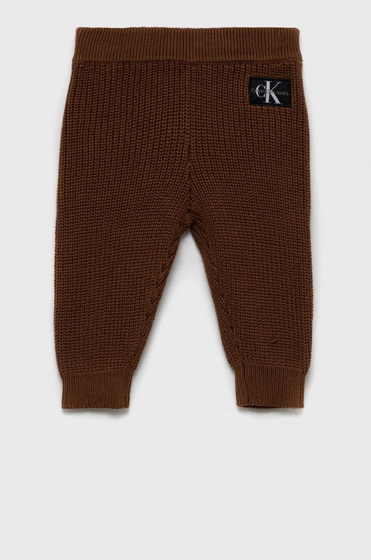 Calvin Klein Jeans spodnie bawełniane dziecięce kolor brązowy gładkie