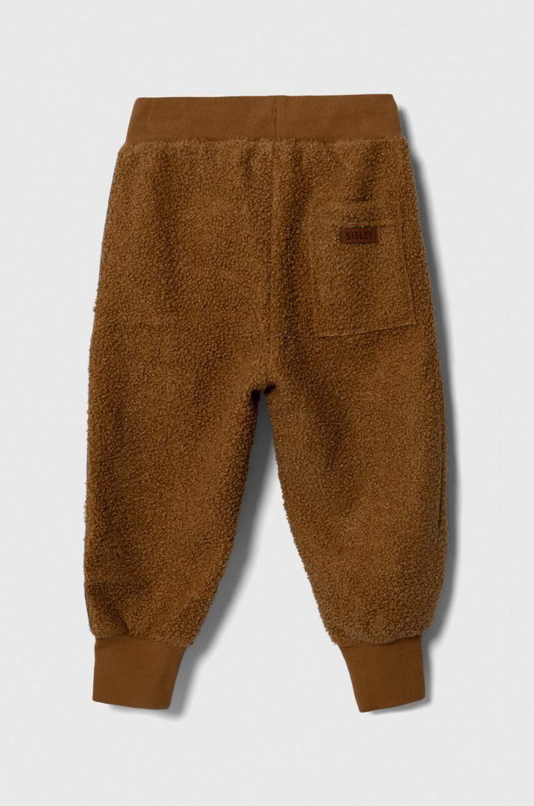 Sisley spodnie dresowe dziecięce kolor brązowy z aplikacją