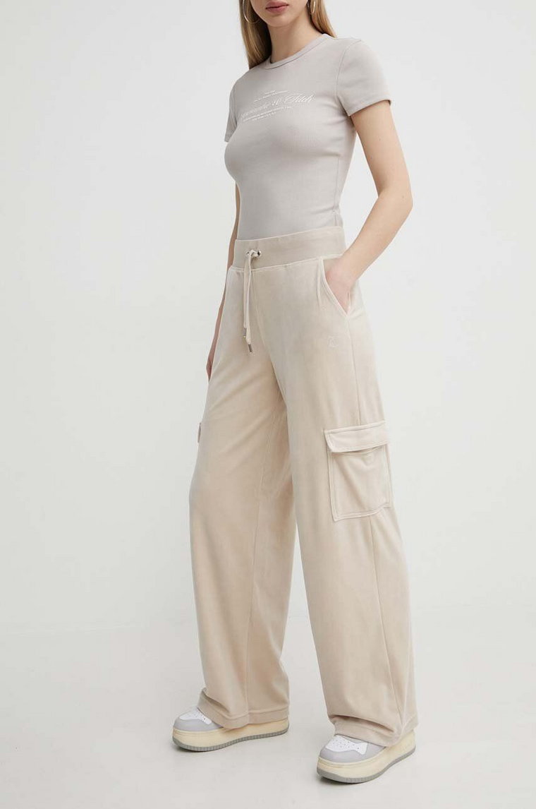 Juicy Couture spodnie dresowe welurowe kolor beżowy z aplikacją
