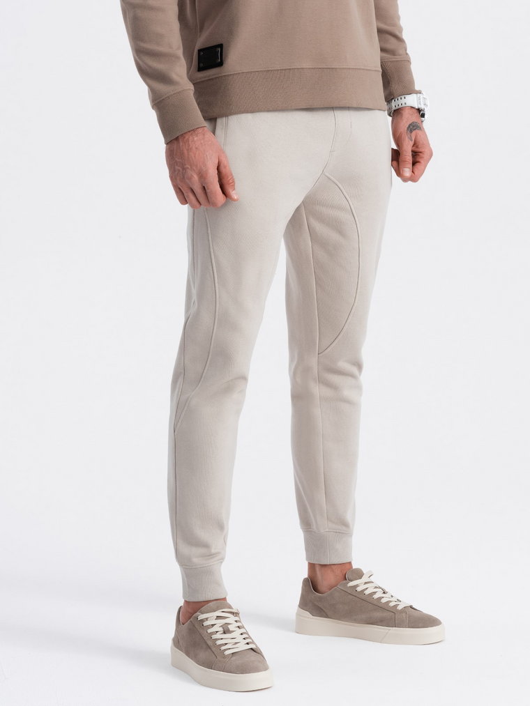 Spodnie męskie dresowe typu jogger - jasnobeżowe V1 OM-PABS-0173
