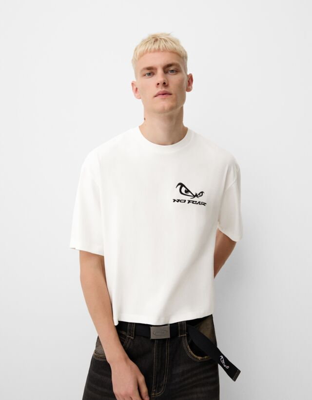 Bershka Krótka Koszulka Relaxed Fit Bershka X No Fear Mężczyzna M Biały