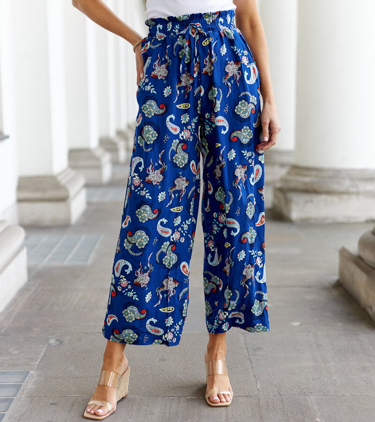Niebieskie szerokie spodnie w kwiaty Palermo