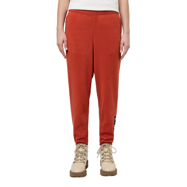 Dziecięce spodnie polarowe Jack Wolfskin SMILEYWORLD PANTS Y intense rust - XS