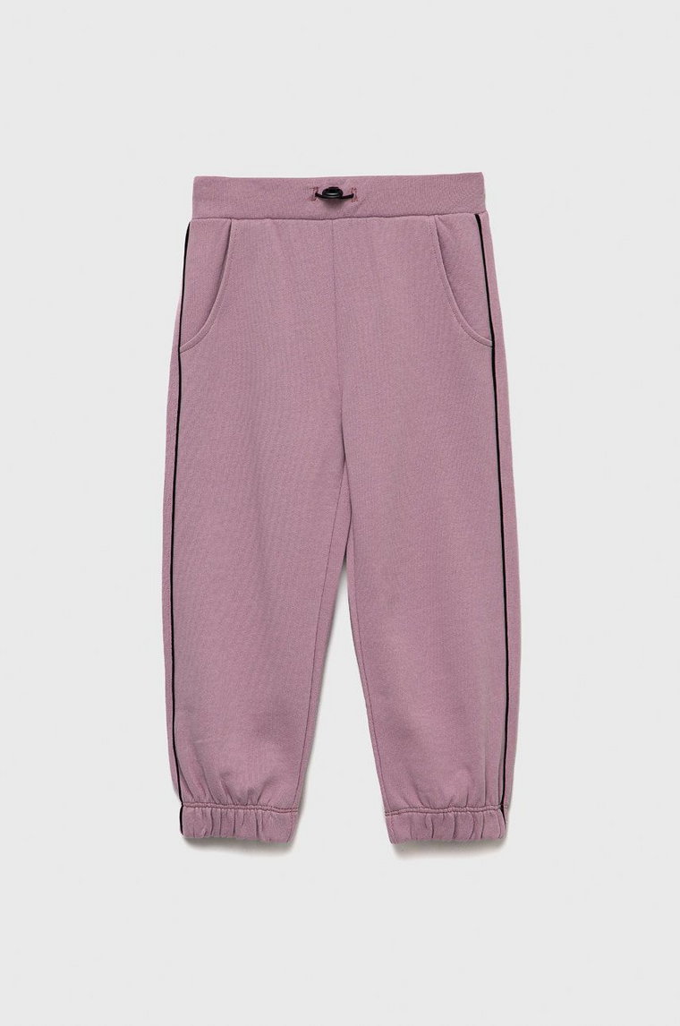 Sisley spodnie dresowe bawełniane dziecięce kolor różowy gładkie