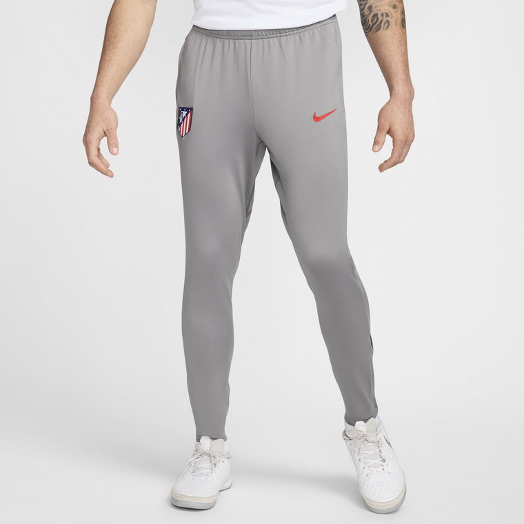 Męskie spodnie piłkarskie Atlético Madryt Strike Nike Dri-FIT - Szary