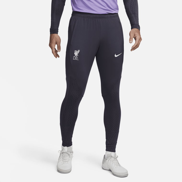 Męskie spodnie piłkarskie z dzianiny Nike Dri-FIT Liverpool F.C. Strike (wersja trzecia) - Szary