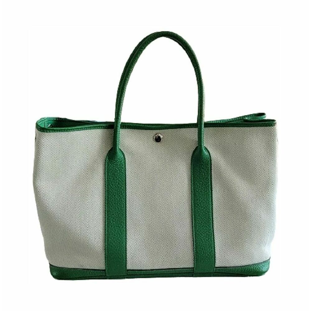 green leather handbag