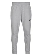Spodnie sportowe męskie - Nike Spodnie sportowe w kolorze szarym - miniaturka - grafika 1