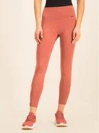 Spodnie sportowe damskie - Nike Legginsy Yoga 7/8 Tights BV5715 Różowy Slim Fit - miniaturka - grafika 1
