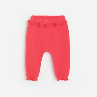 Spodnie i spodenki dla dziewczynek - Reserved Bawełniane spodnie z falbaną - Pomarańczowy - grafika 1