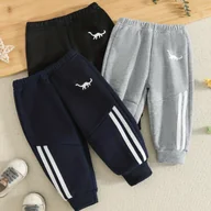 Spodnie i spodenki dla chłopców - TEMU 3 szt. Zimowe Spodnie Dresowe dla Chłopców z Nadrukiem Dinozaurów i Elastycznym Pasem - Pluszowe Ciepło, Białe Paski Dino, Dres (Czarny/Szary) - - miniaturka - grafika 1